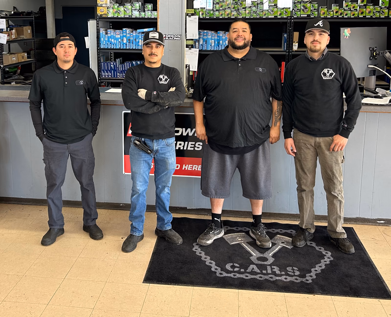 The C.A.R.S. Automotive team at the parts counter